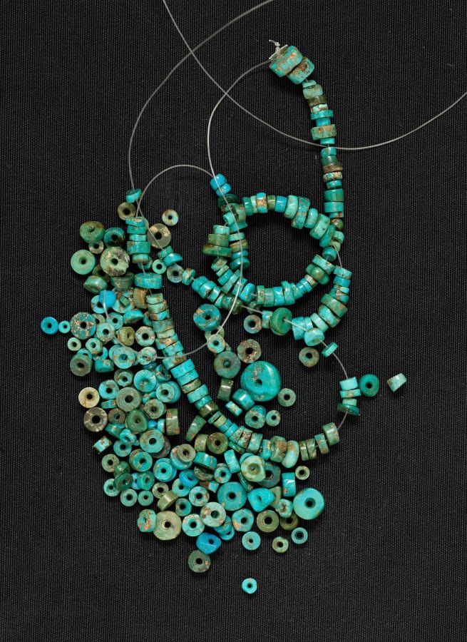 Modern blue beads removed from Necklace — artwork